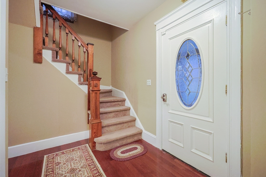 11 Hockanum Way Worcester, MA 01606 - Photo 16 of 36 a view of an entryway with wooden floor