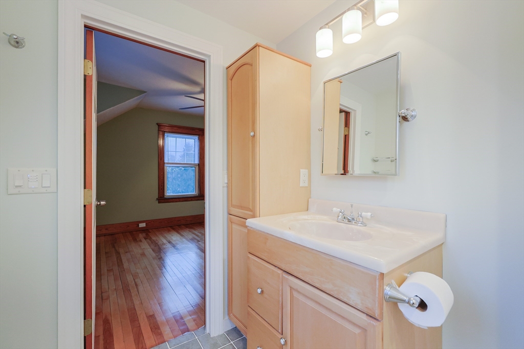11 Hockanum Way Worcester, MA 01606 - Photo 20 of 36 a bathroom with a sink and a mirror