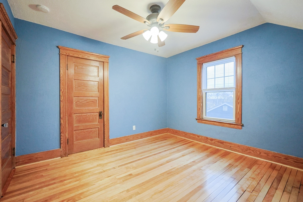 11 Hockanum Way Worcester, MA 01606 - Photo 22 of 36 a view of a room with a window and a ceiling fan