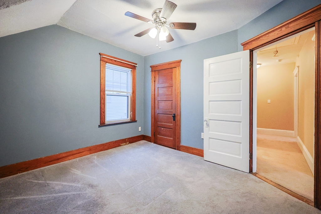 11 Hockanum Way Worcester, MA 01606 - Photo 23 of 36 a view of an empty room with a window