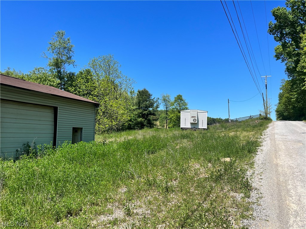 10007 March Road Northeast East Rochester, OH 44625 - Photo 1 of 5 Street View