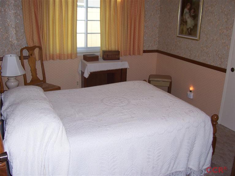 4413 Aquarius Road Lompoc, CA 93436 - Photo 17 of 19 a bedroom with a bed and a window