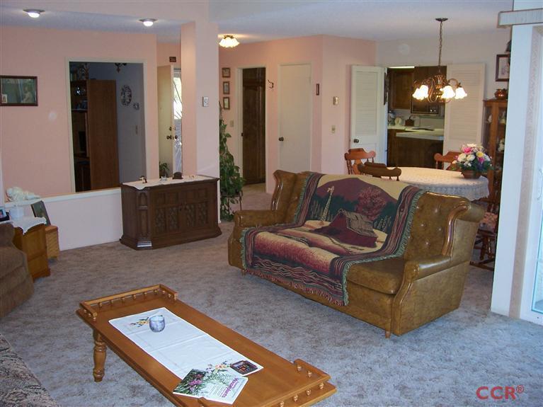 4413 Aquarius Road Lompoc, CA 93436 - Photo 9 of 19 a living room with furniture and a wooden floor
