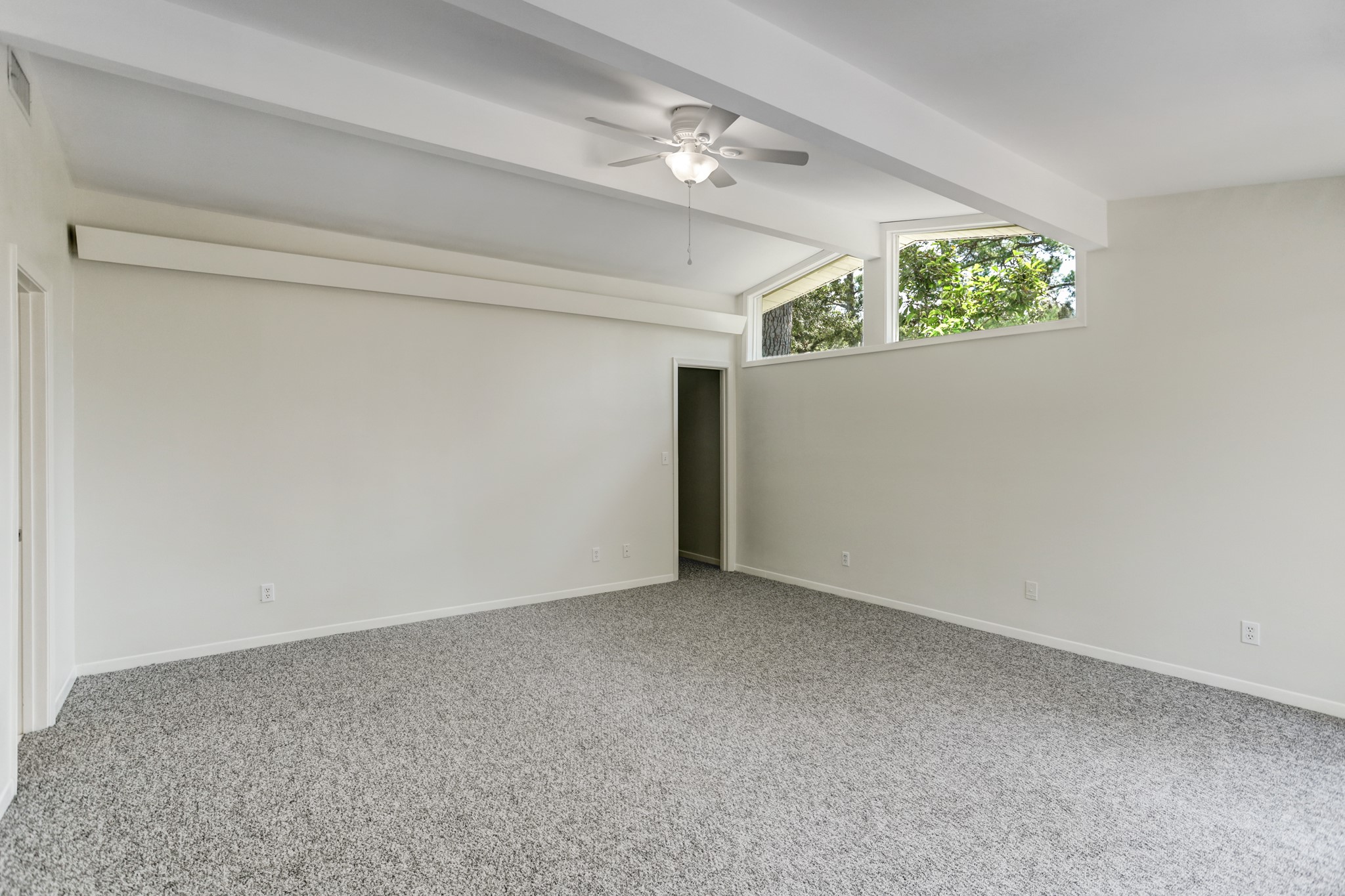 10226 Ivyridge Road Houston, TX 77043 - Photo 14 of 37 a view of an empty room with a window