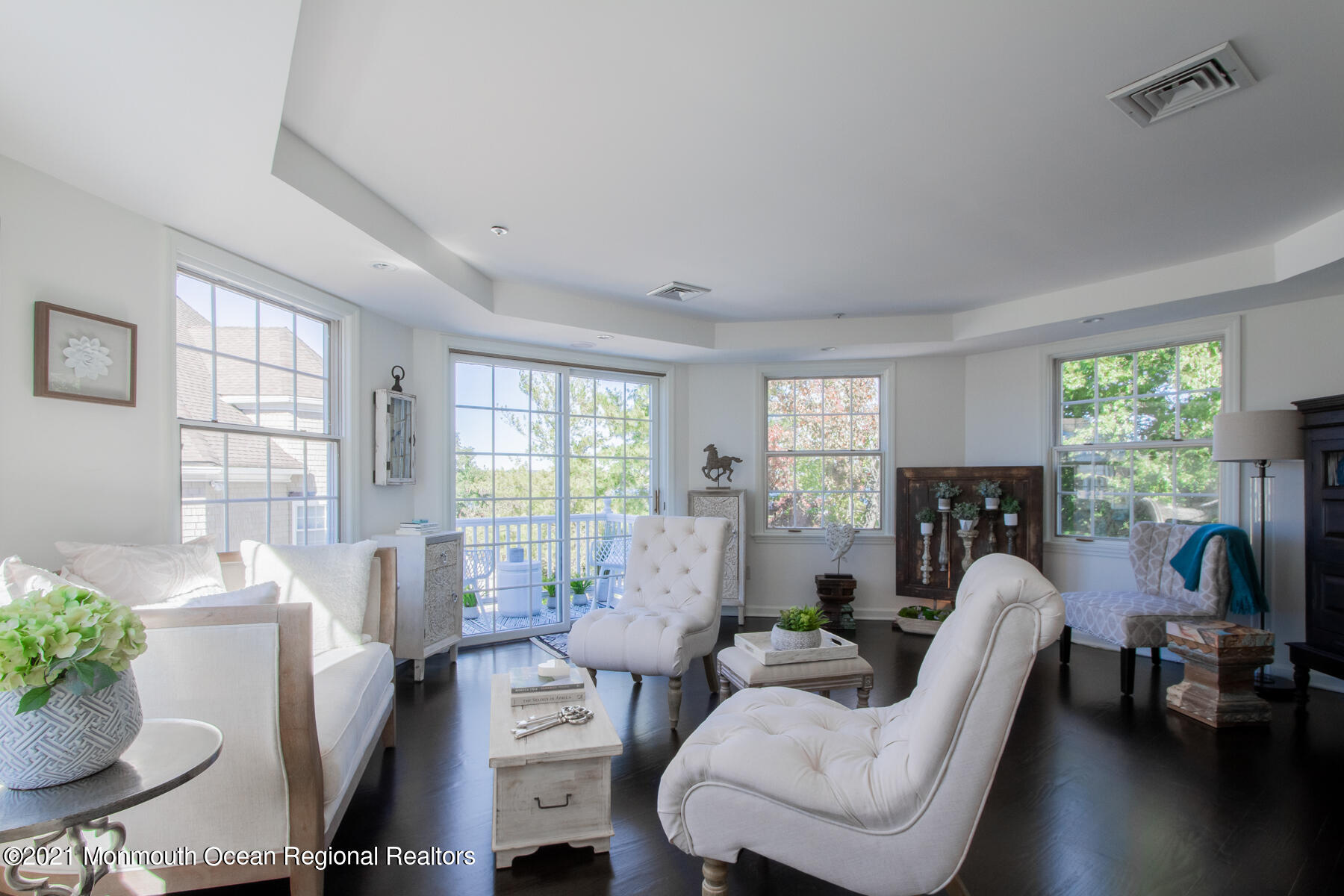 62 B West Front Street Red Bank, NJ 07701 - Photo 17 of 45 a living room with furniture a chandelier and a large window