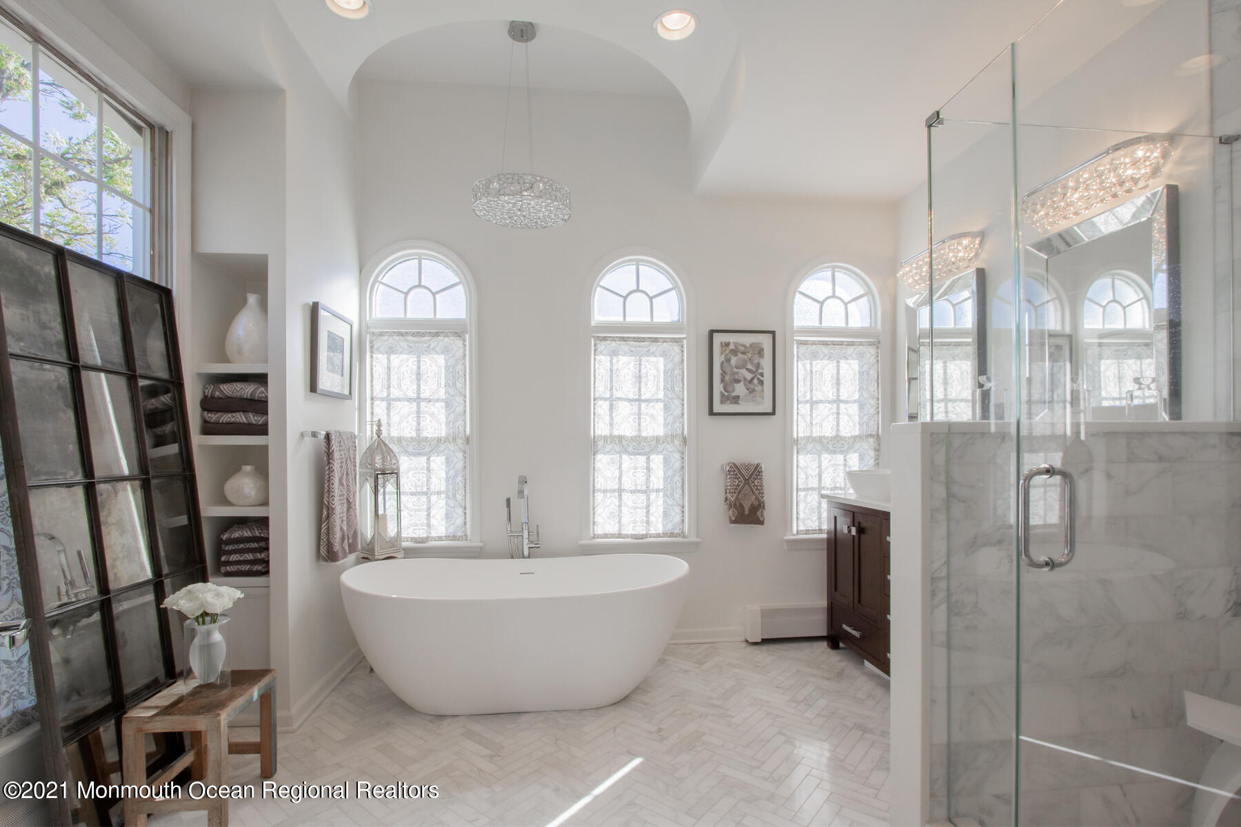 62 B West Front Street Red Bank, NJ 07701 - Photo 22 of 45 a spacious bathroom with a tub shower and windows