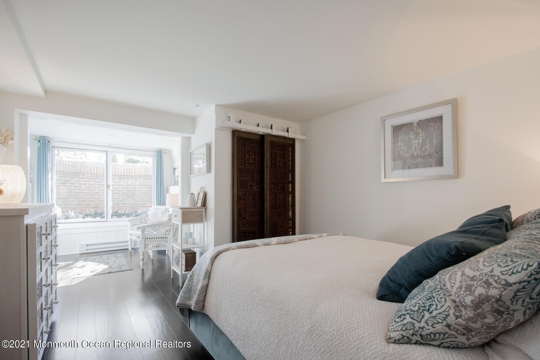 62 B West Front Street Red Bank, NJ 07701 - Photo 25 of 45 a bedroom with a bed and a large window