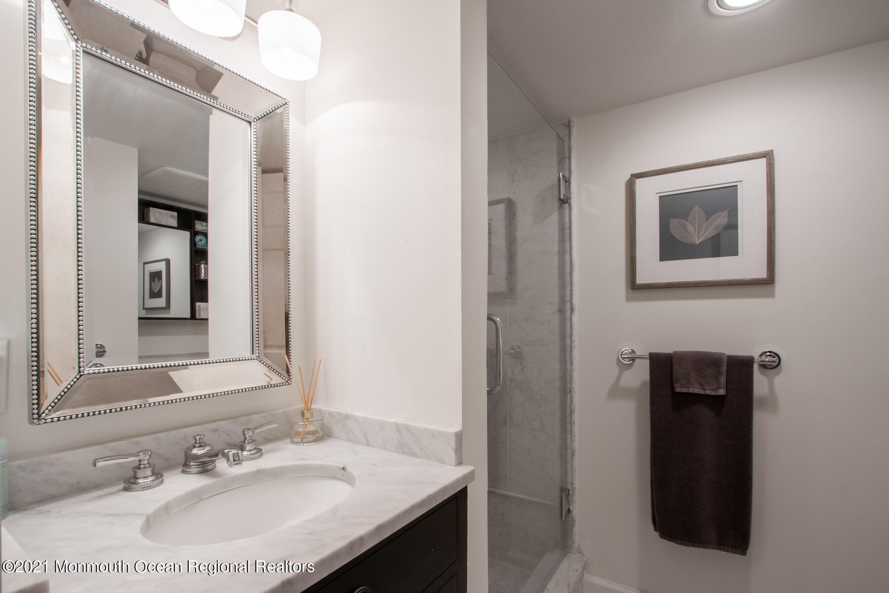 62 B West Front Street Red Bank, NJ 07701 - Photo 28 of 45 a bathroom with a sink and a mirror