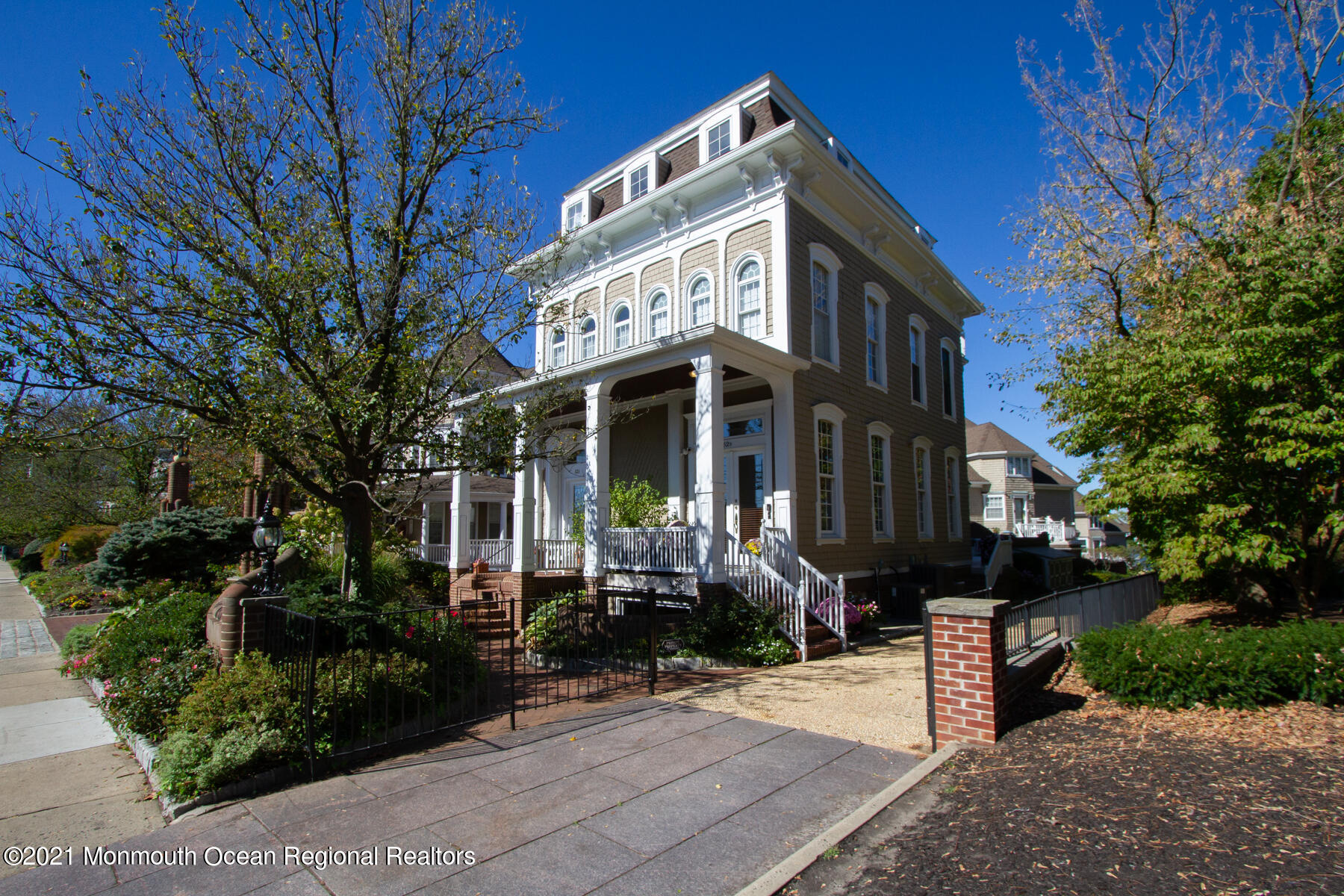 62 B West Front Street Red Bank, NJ 07701 - Photo 36 of 45 a front view of a house with a garden
