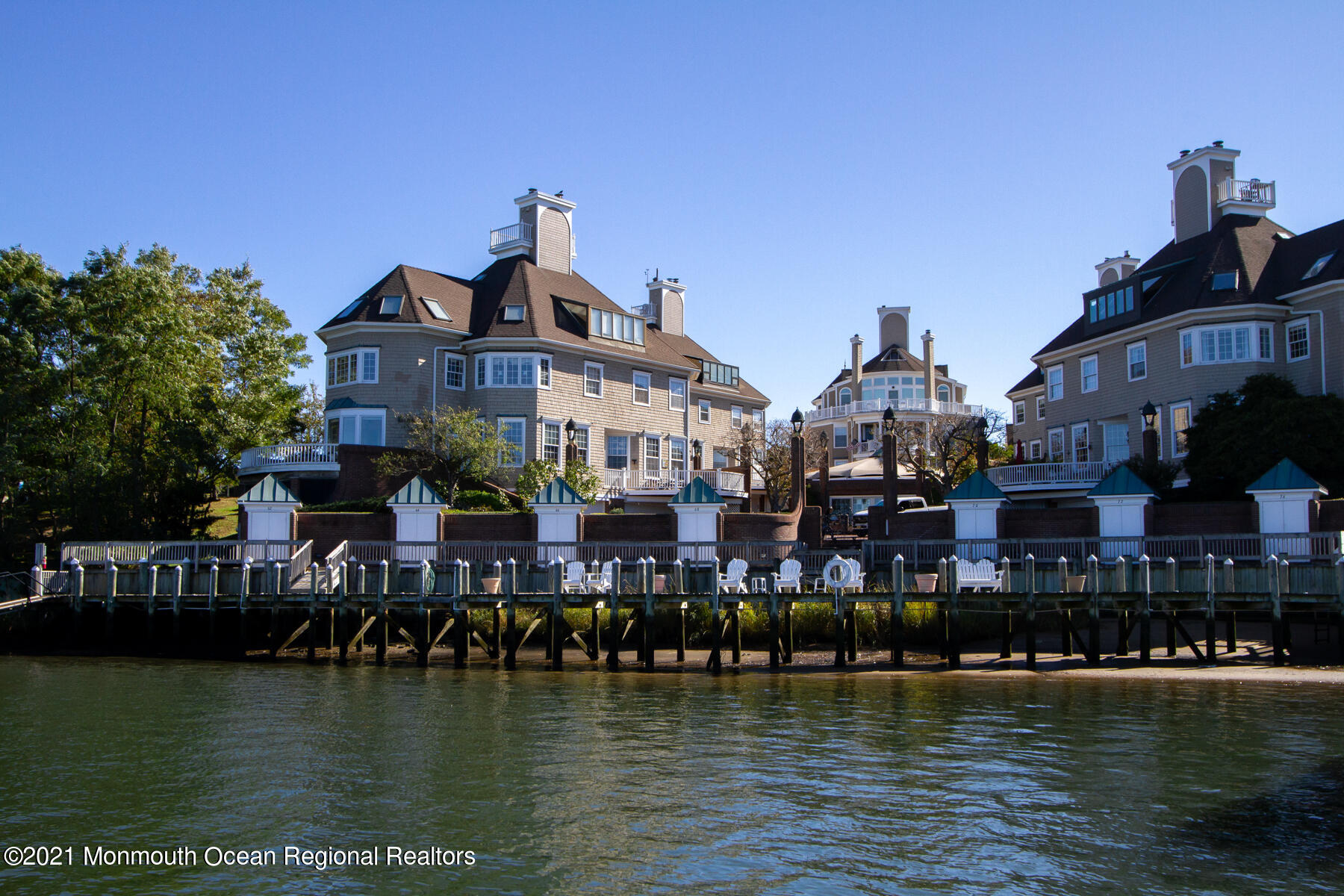 62 B West Front Street Red Bank, NJ 07701 - Photo 39 of 45 a view of a lake with boats and a building