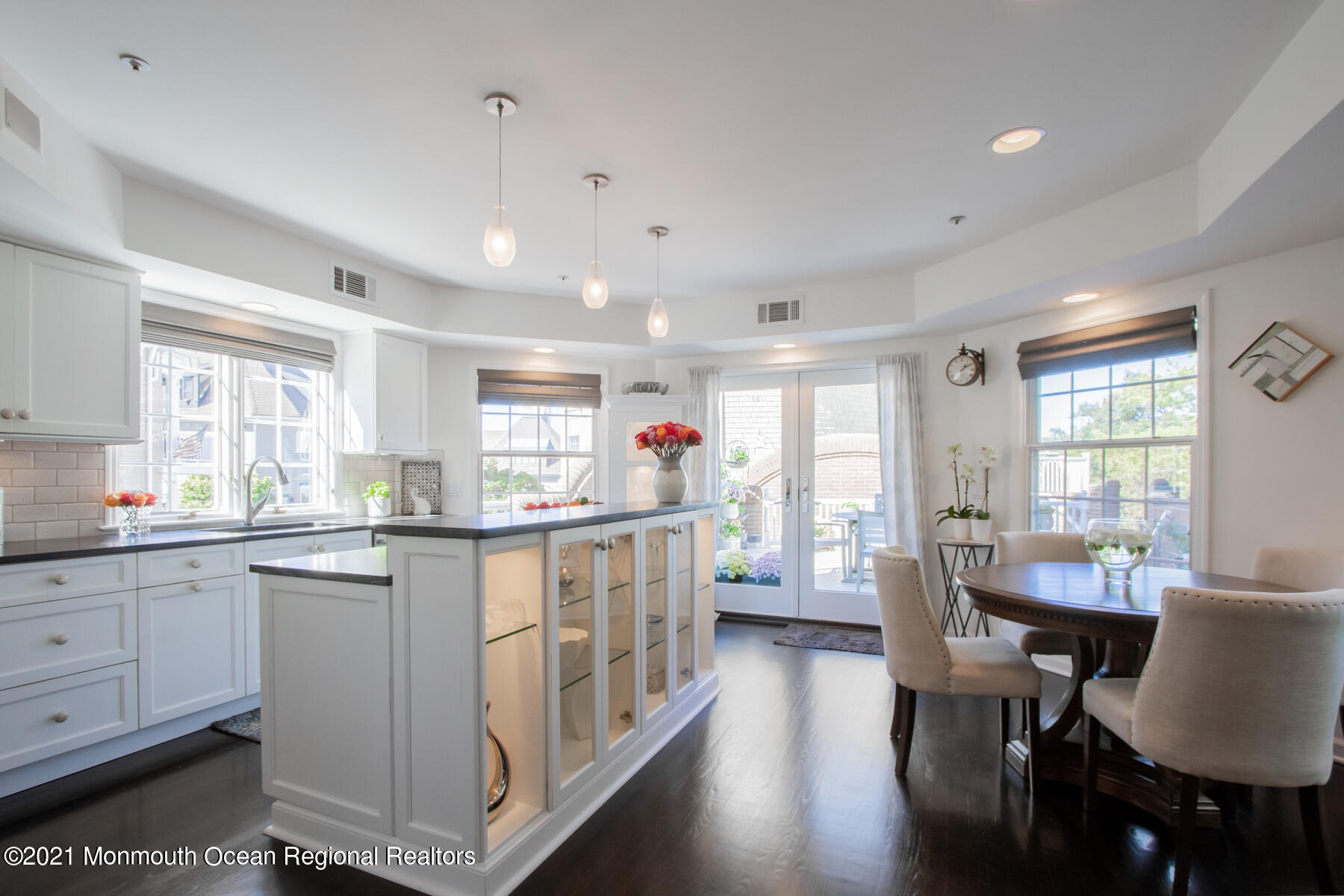 62 B West Front Street Red Bank, NJ 07701 - Photo 5 of 45 a kitchen with counter top space a sink appliances and living room view