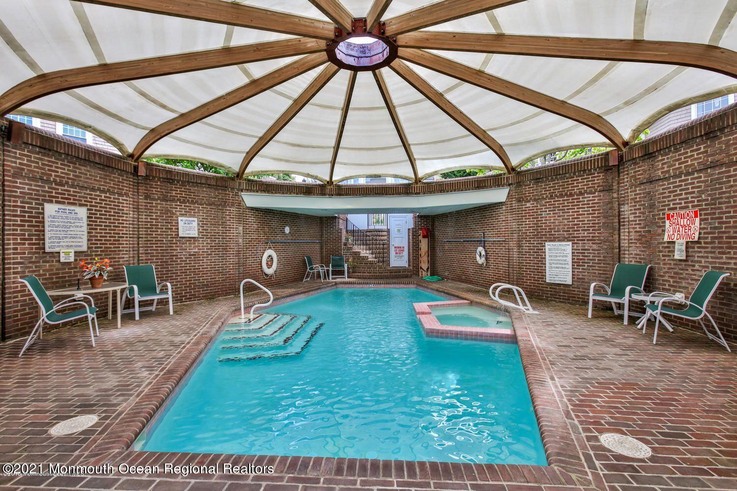 62 B West Front Street Red Bank, NJ 07701 - Photo 43 of 45 a view of a backyard with table and chairs