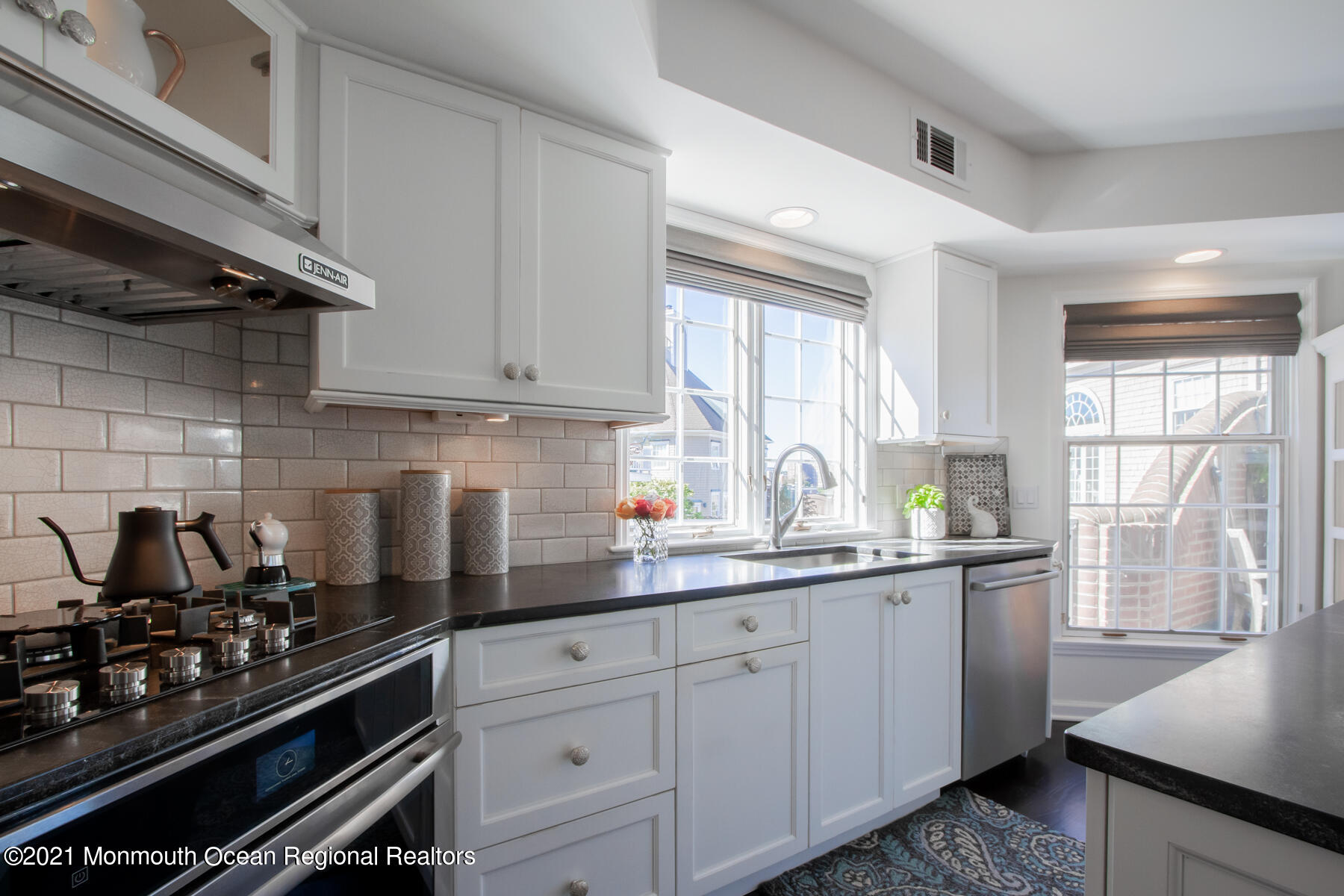 62 B West Front Street Red Bank, NJ 07701 - Photo 6 of 45 a kitchen with sink a stove and cabinets