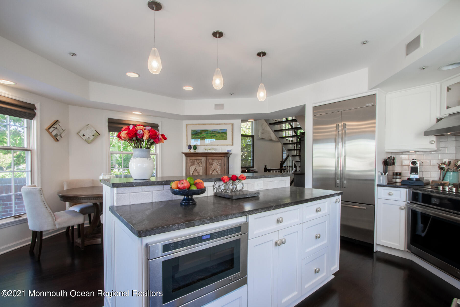 62 B West Front Street Red Bank, NJ 07701 - Photo 7 of 45 a kitchen that has a lot of cabinets a sink and appliances in it