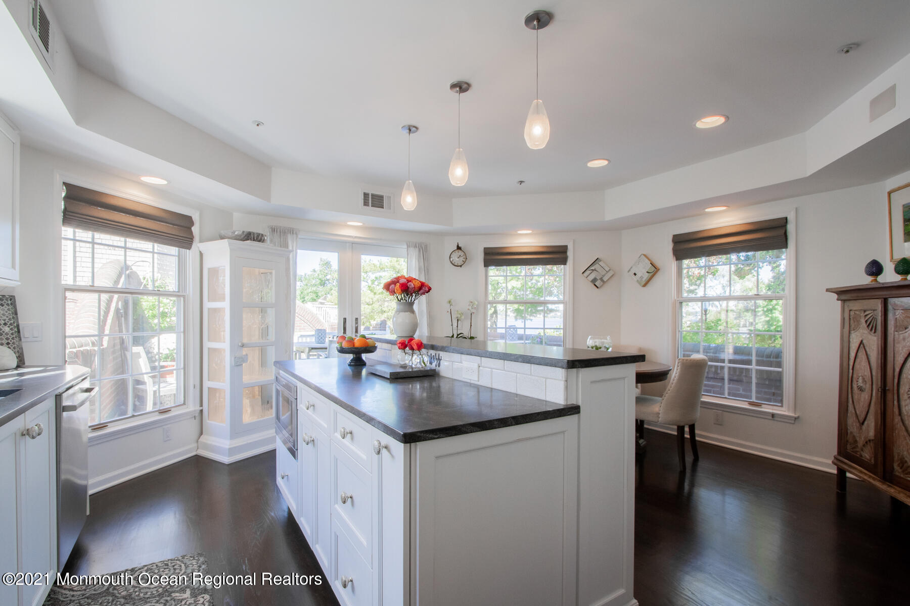 62 B West Front Street Red Bank, NJ 07701 - Photo 8 of 45 a kitchen with granite countertop a stove a sink a refrigerator and wooden floor