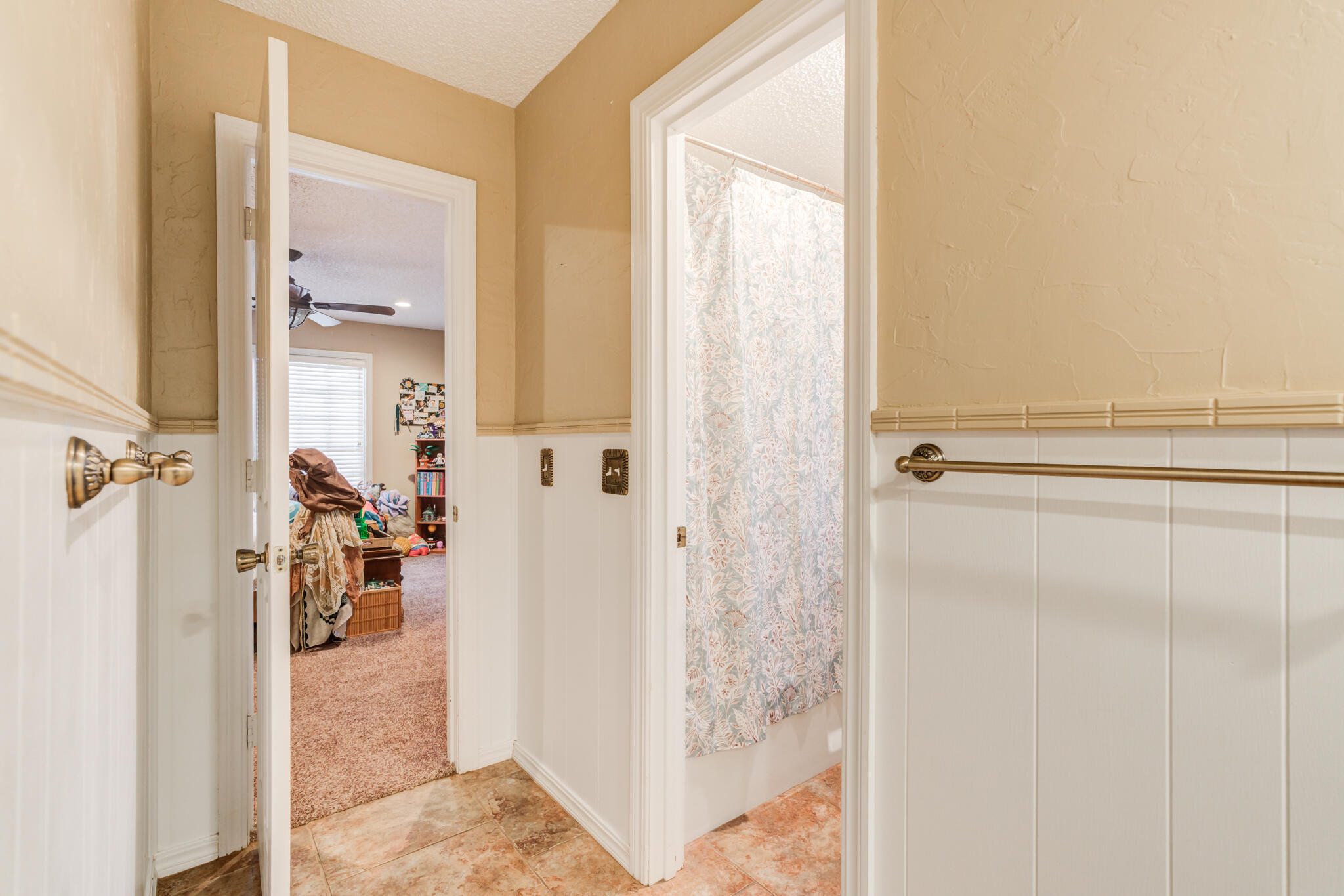 5713 76th Street Lubbock, TX 79424 - Photo 37 of 62 a view of a bathroom with a shower