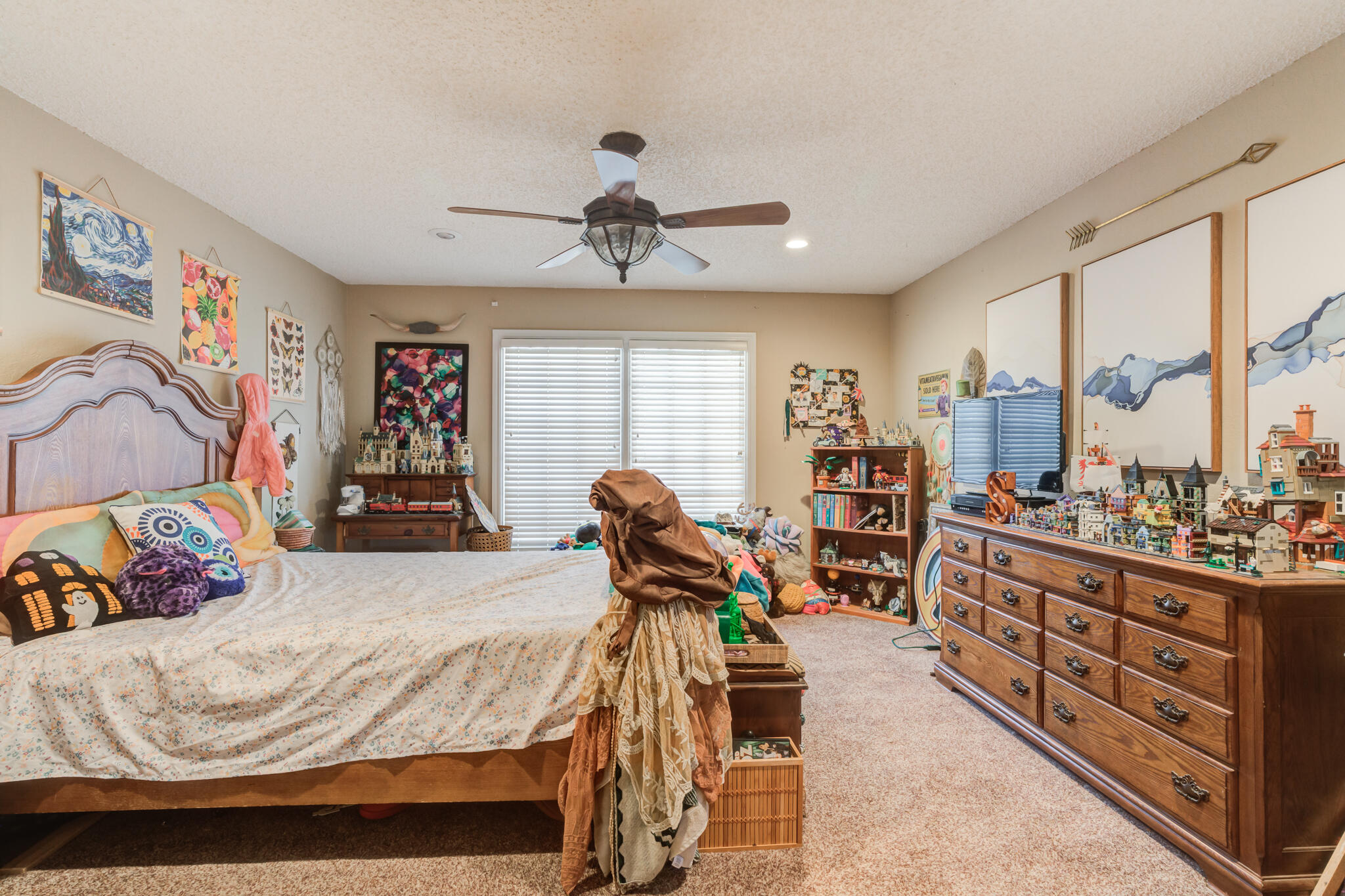 5713 76th Street Lubbock, TX 79424 - Photo 40 of 62 a bed room with a bed and a window