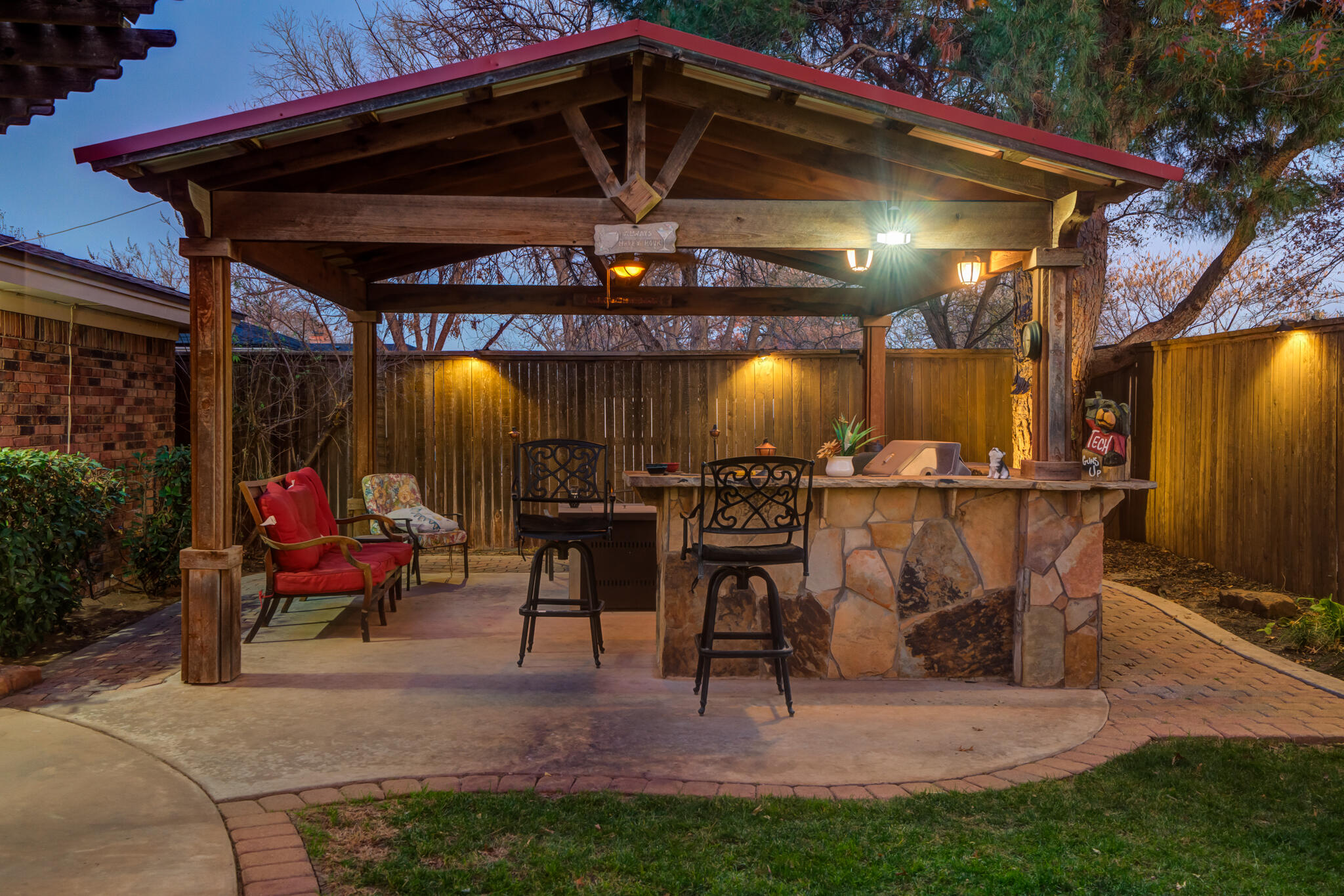 5713 76th Street Lubbock, TX 79424 - Photo 56 of 62 a patio with a table and chairs