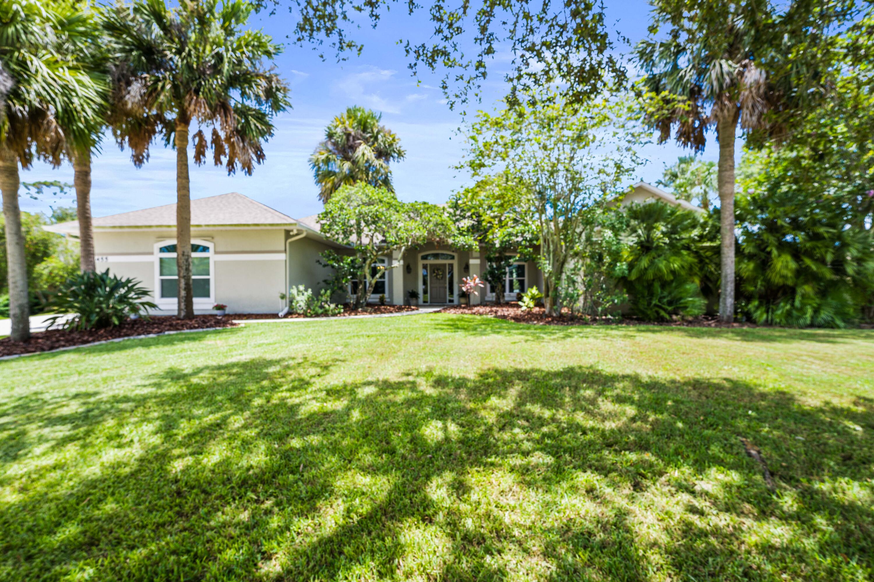 a view of a house with a big yard