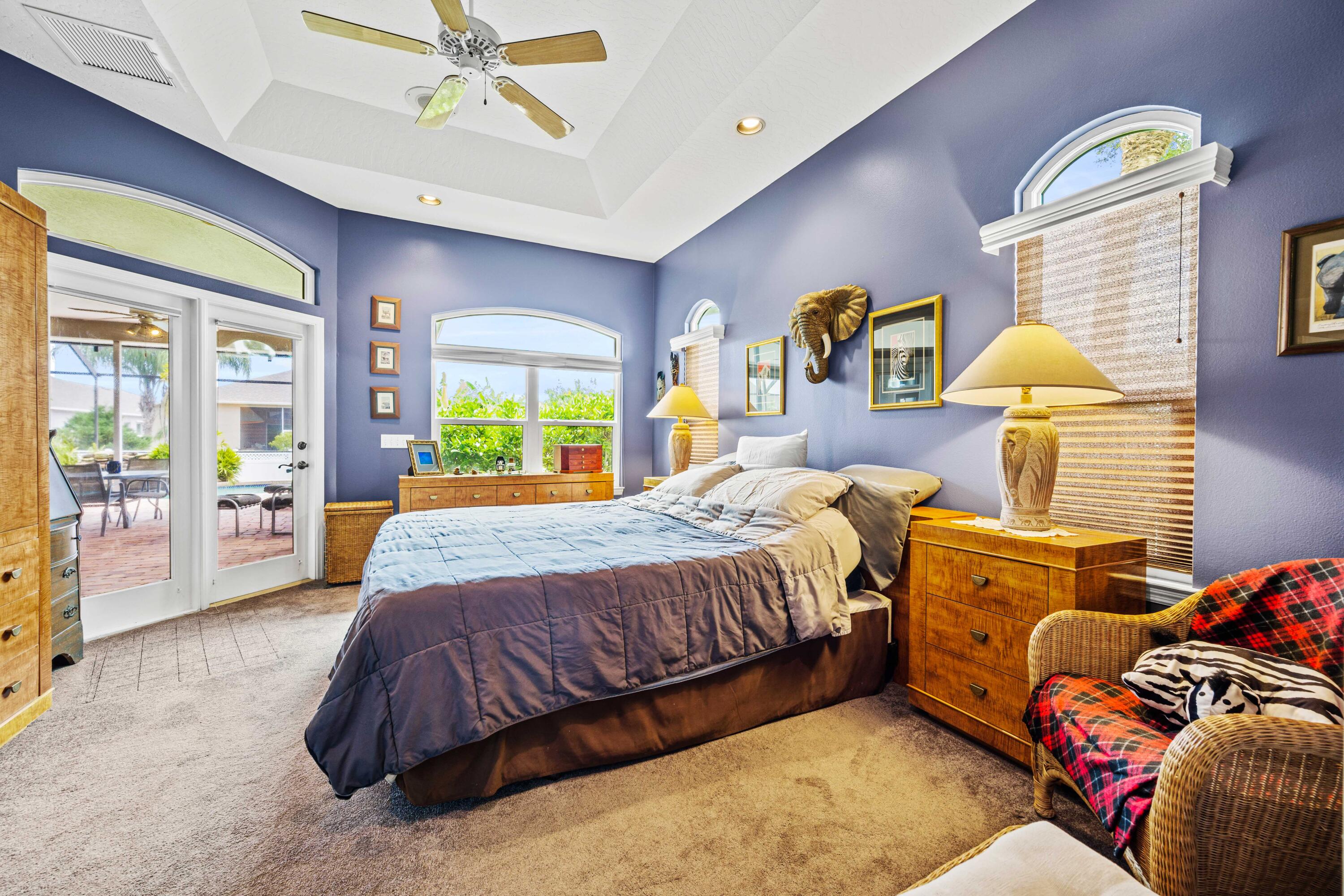 3455 Shady Run Road Melbourne, FL 32934 - Photo 11 of 47 a spacious bedroom with a bed and window