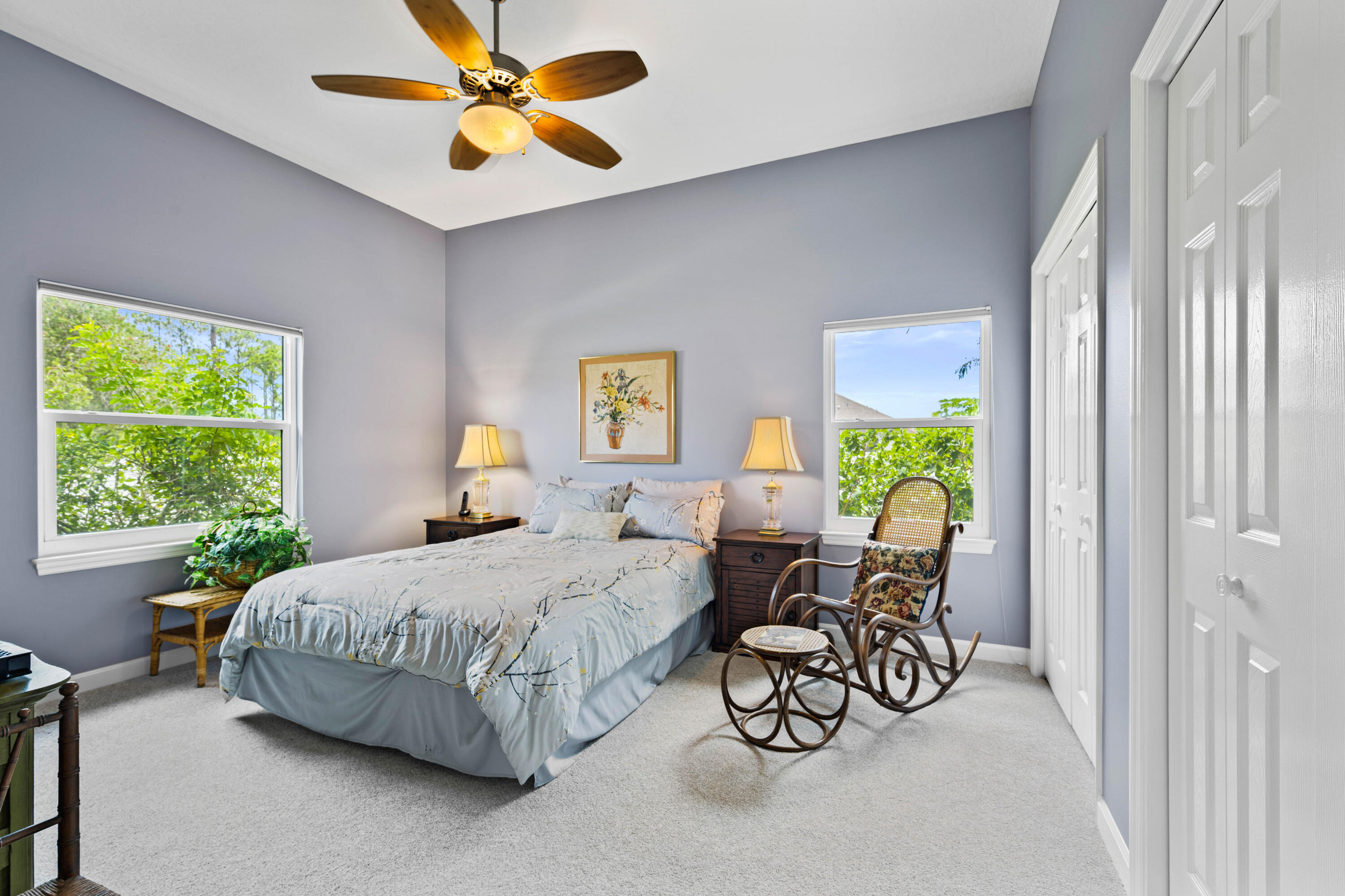 3455 Shady Run Road Melbourne, FL 32934 - Photo 13 of 47 a bedroom with a bed and a table