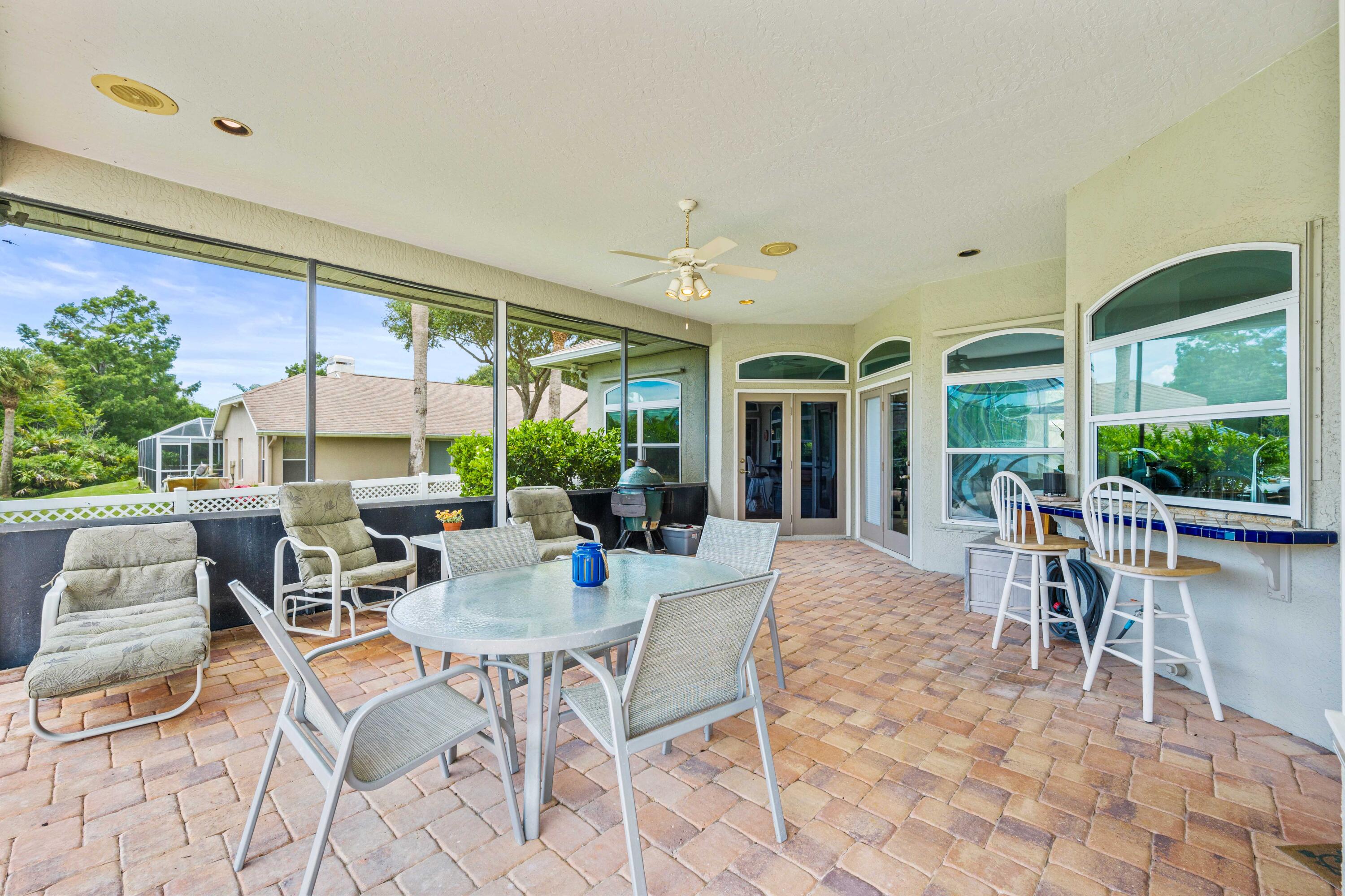 3455 Shady Run Road Melbourne, FL 32934 - Photo 17 of 47 a view of a dining room with furniture window and outside view