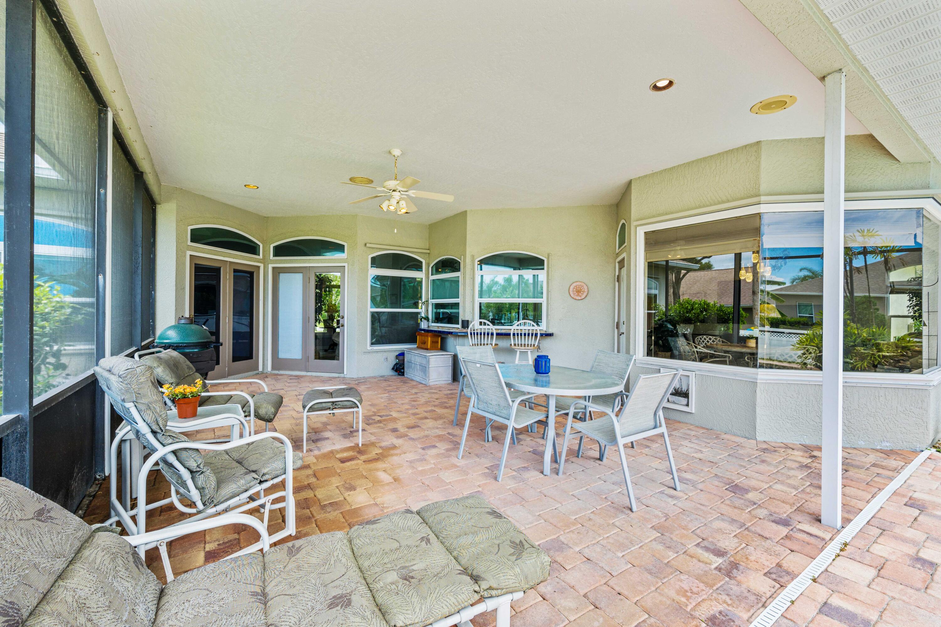 3455 Shady Run Road Melbourne, FL 32934 - Photo 18 of 47 a outdoor space with lots of tables and chairs