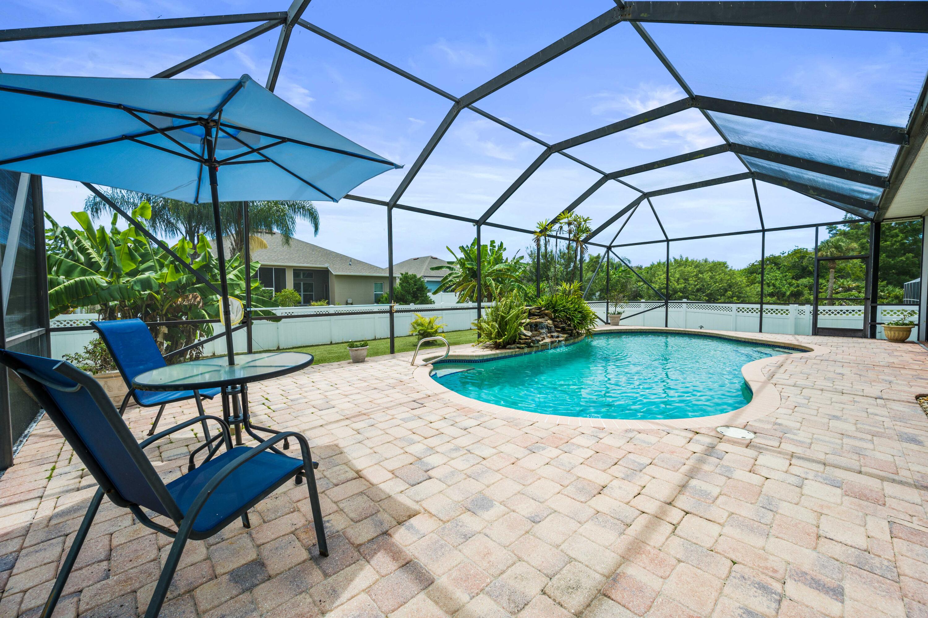 3455 Shady Run Road Melbourne, FL 32934 - Photo 20 of 47 a view of a swimming pool with a patio
