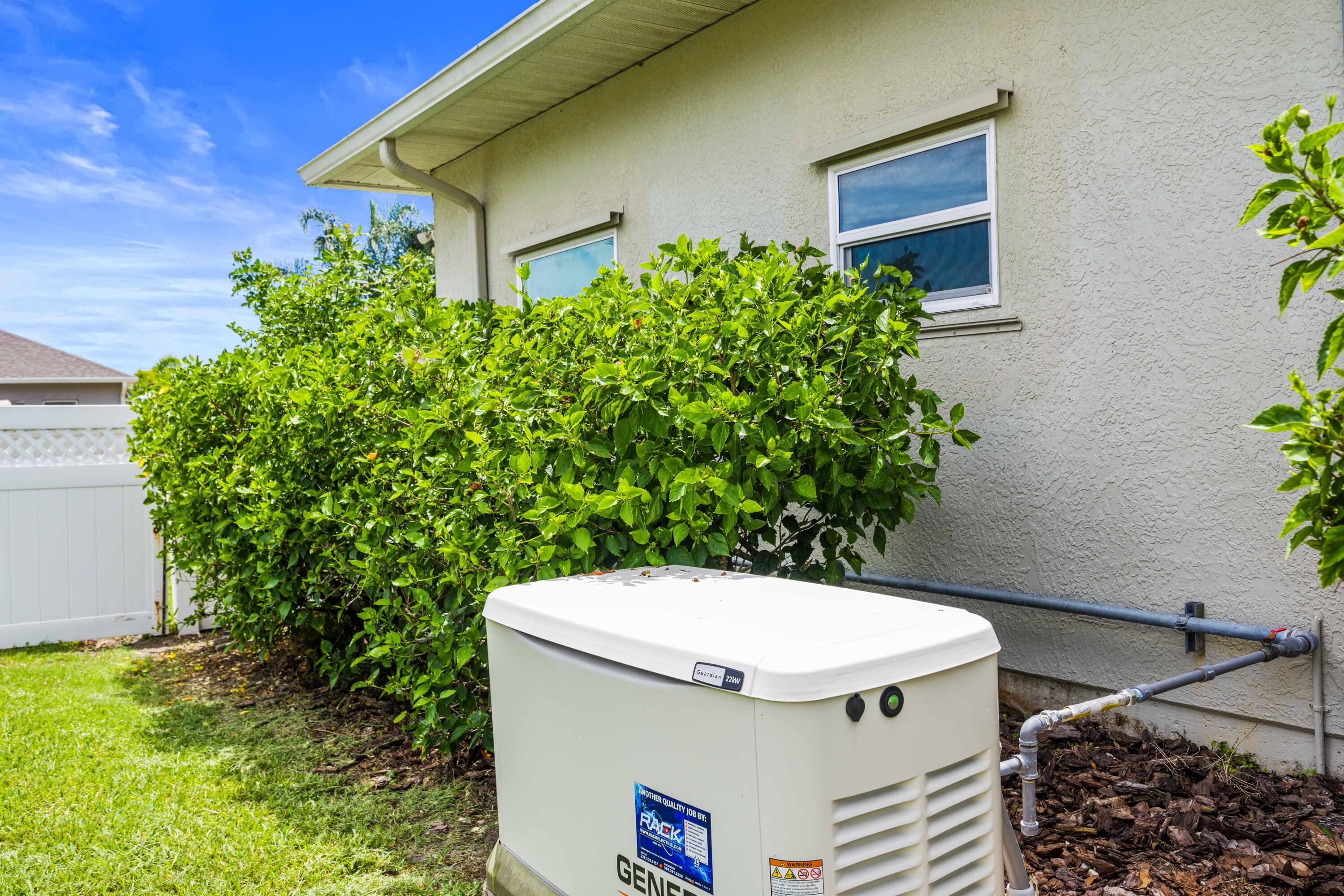 3455 Shady Run Road Melbourne, FL 32934 - Photo 25 of 47 a side view of a house with a yard