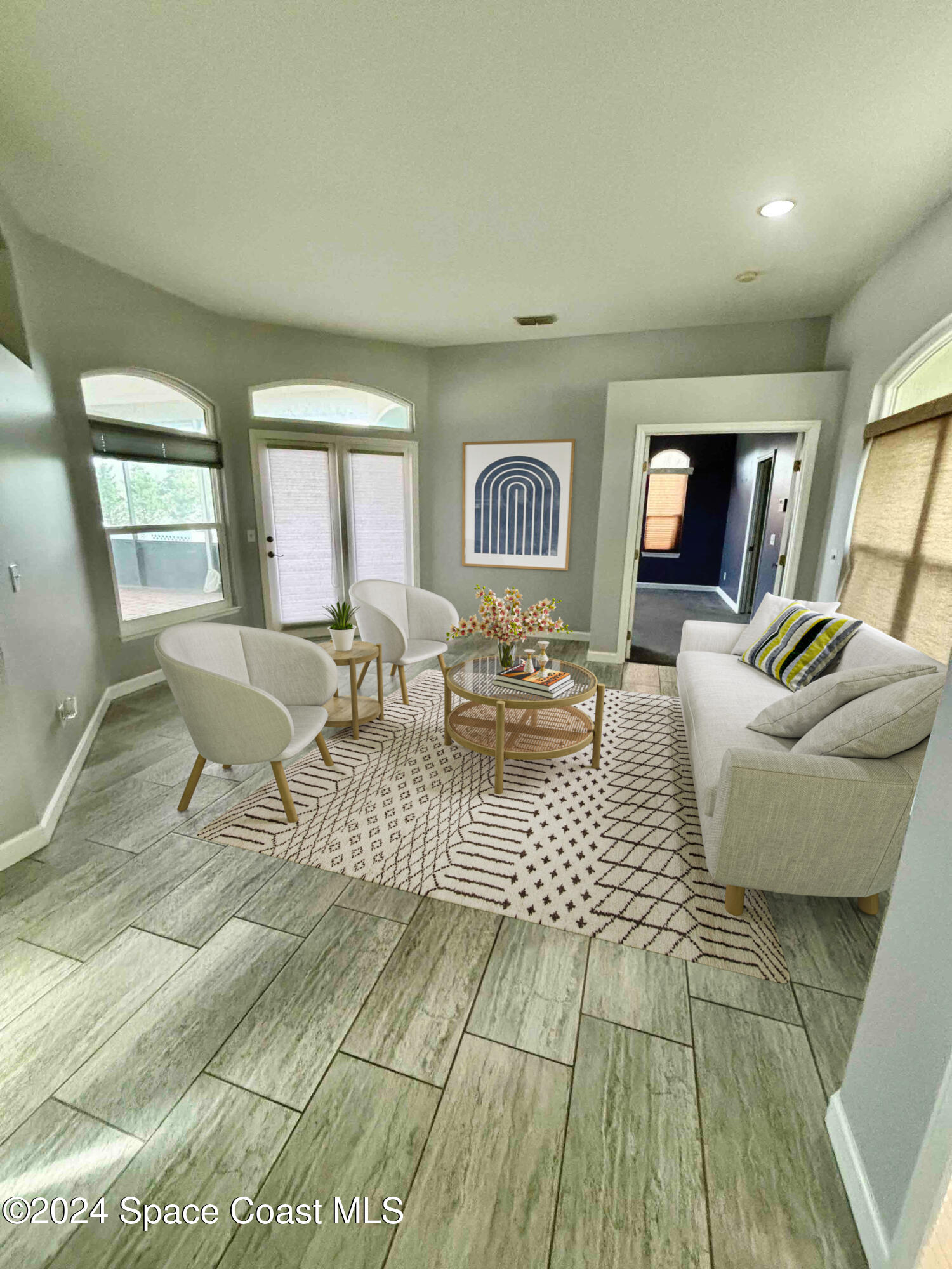3455 Shady Run Road Melbourne, FL 32934 - Photo 4 of 47 a living room with furniture and a couch