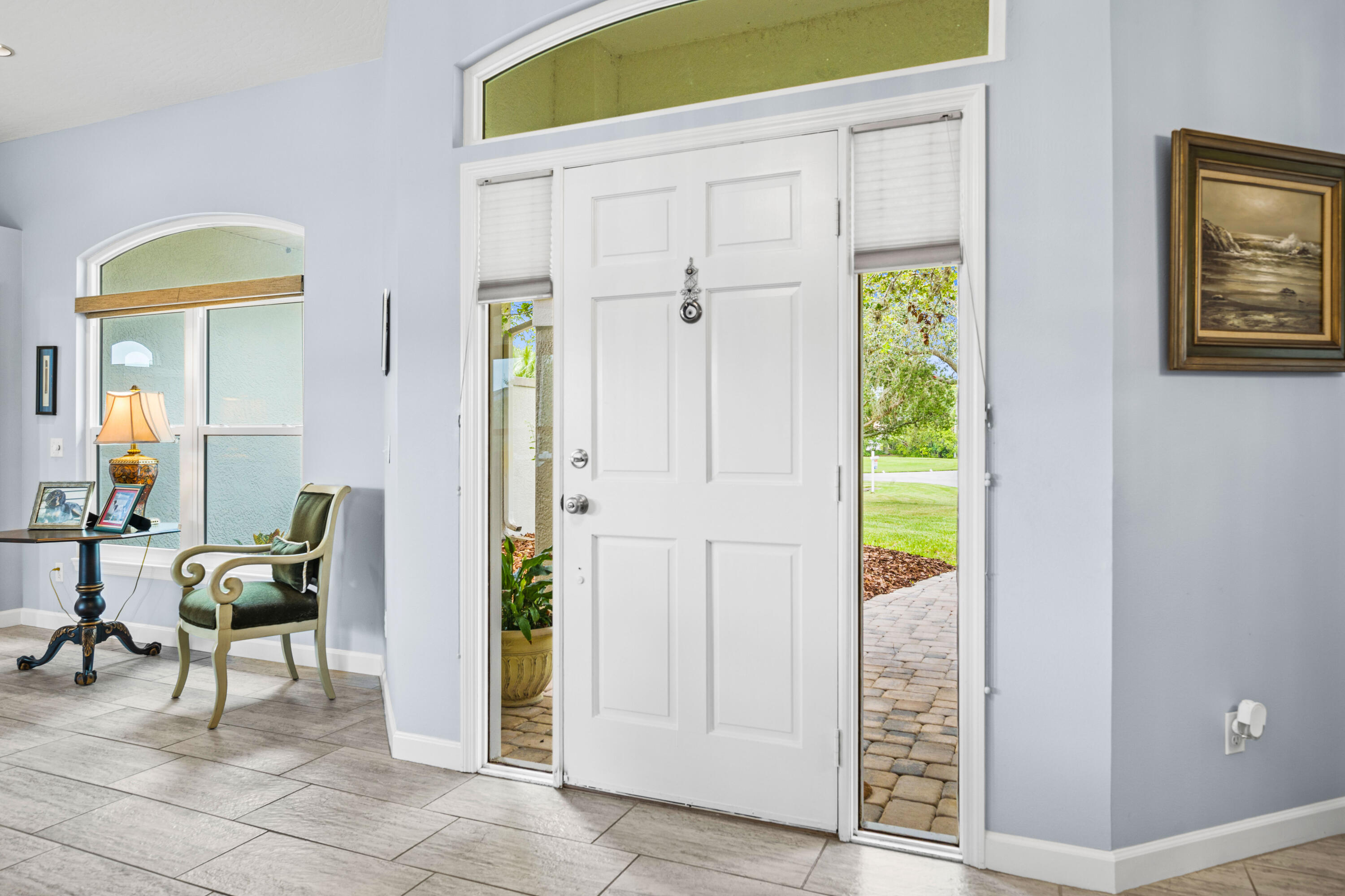 3455 Shady Run Road Melbourne, FL 32934 - Photo 7 of 47 a view of an entryway with table and chair