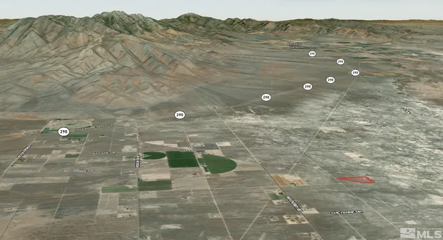 a view of a backyard of the house