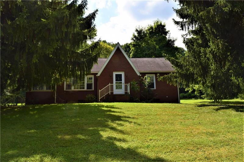 1035 Indian Creek Valley Road Normalville, PA 15469 - Photo 1 of 25 EXTERIOR FRONT - SOLIDLY BUILT BRICK HOME!