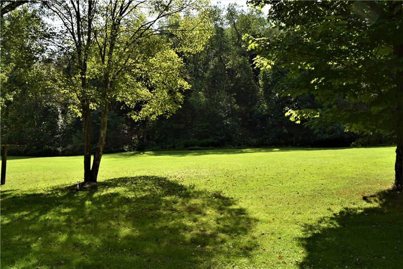 1035 Indian Creek Valley Road Normalville, PA 15469 - Photo 5 of 25 PROPERTY EXTENDS INTO THE WOODED AREA!