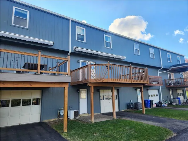 a view of a building with a garden