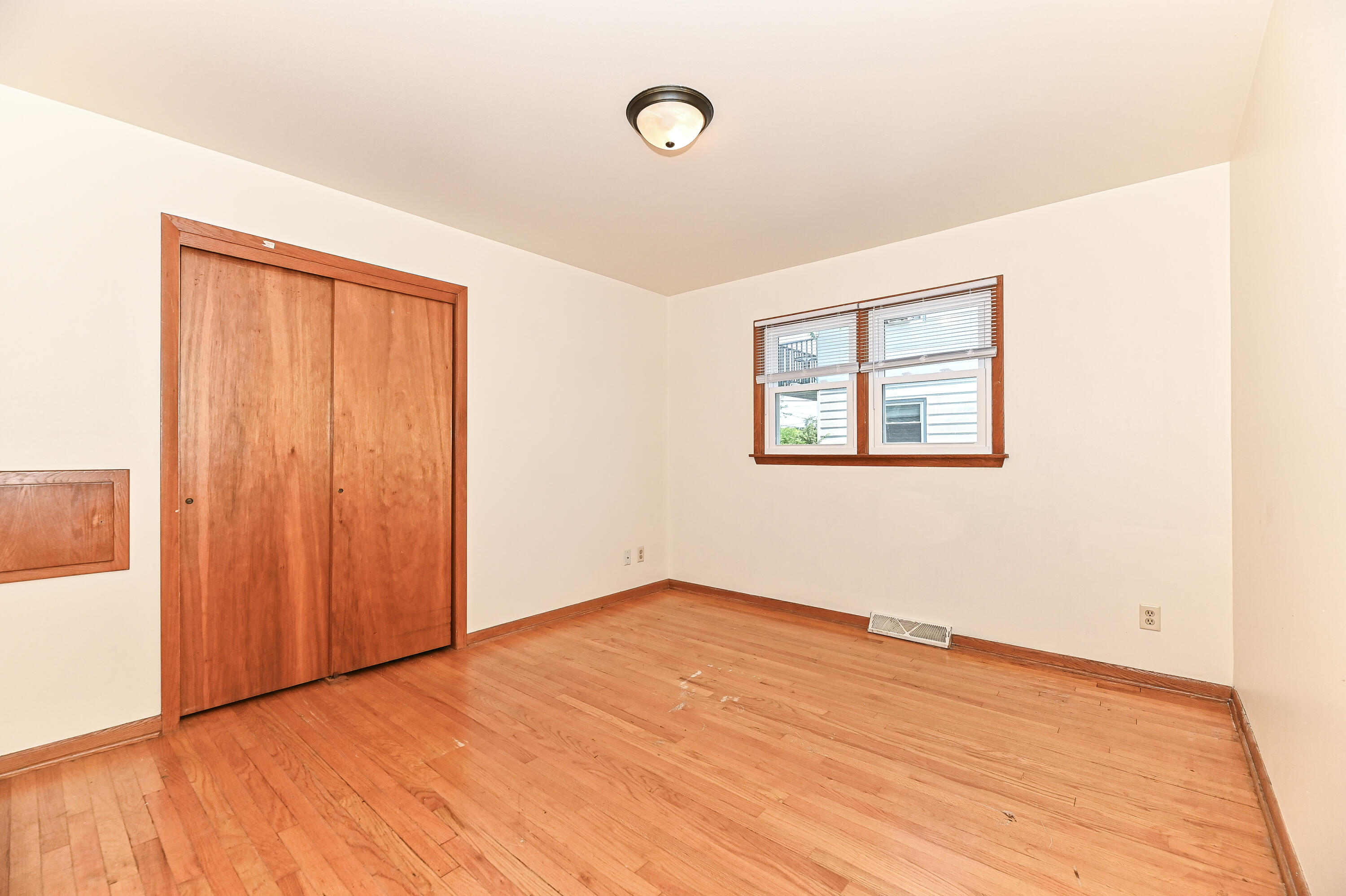 1728 Cleveland Avenue, Unit 1730 Racine, WI 53405 - Photo 16 of 39 Primary Bedroom