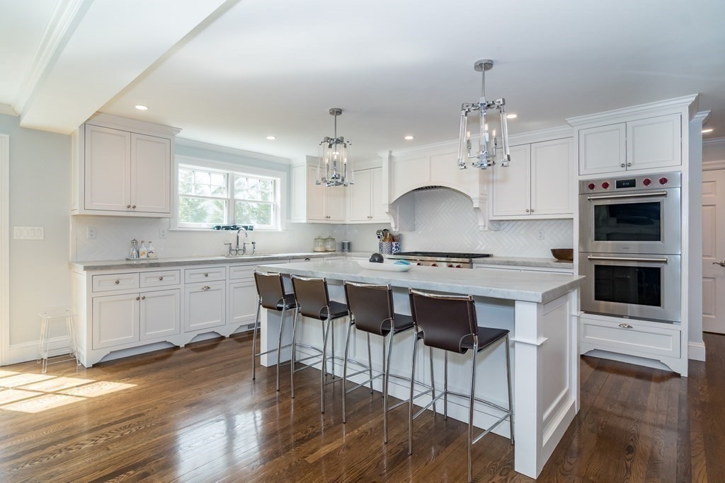92 Old Colony Road Wellesley, MA 02481 - Photo 3 of 28 a view of kitchen with sink refrigerator dining table and chairs