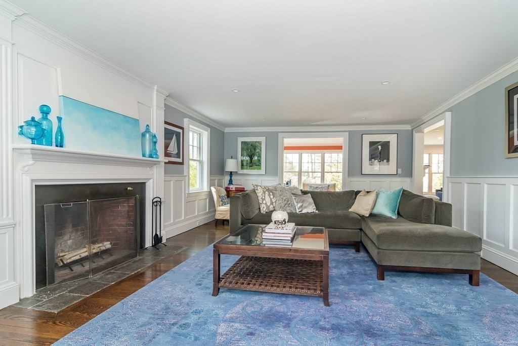 92 Old Colony Road Wellesley, MA 02481 - Photo 9 of 28 a living room with furniture and a fireplace