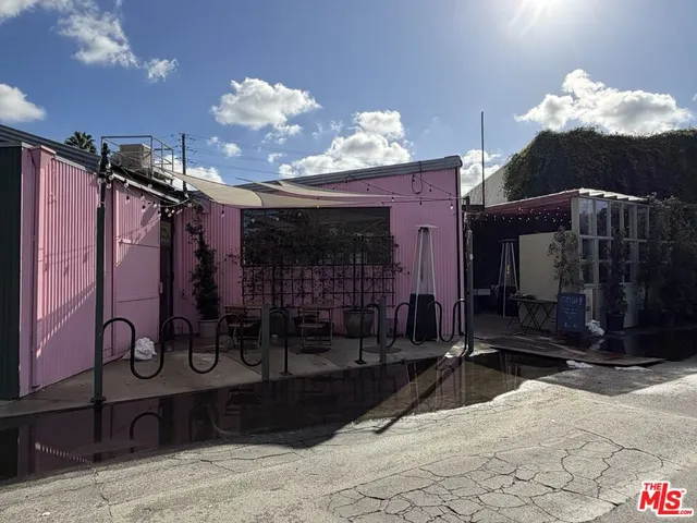 a view of street with sitting area