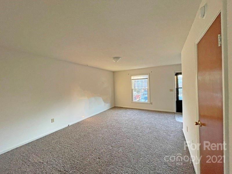 4887 County Home Road, Unit D3 Conover, NC 28613 - Photo 3 of 7 an empty room with windows