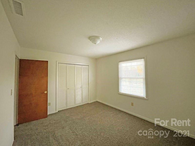 4887 County Home Road, Unit D3 Conover, NC 28613 - Photo 7 of 7 a view of an empty room with a window