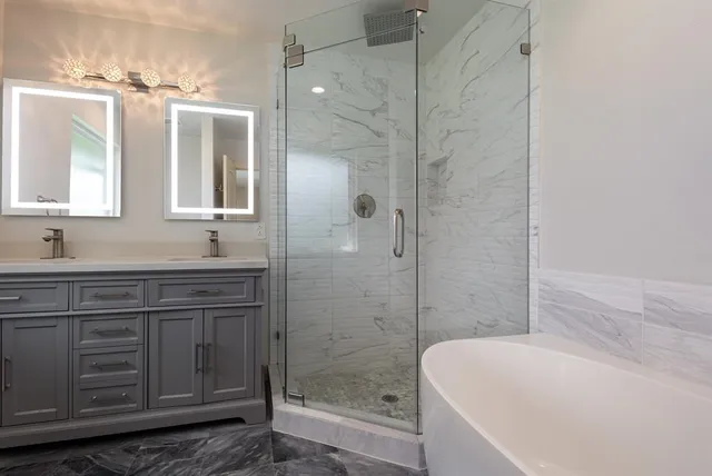 a bathroom with a bathtub and a sink