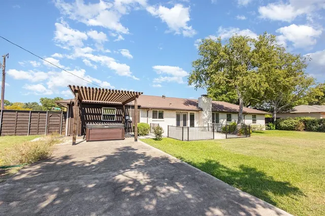 a house view with a garden space
