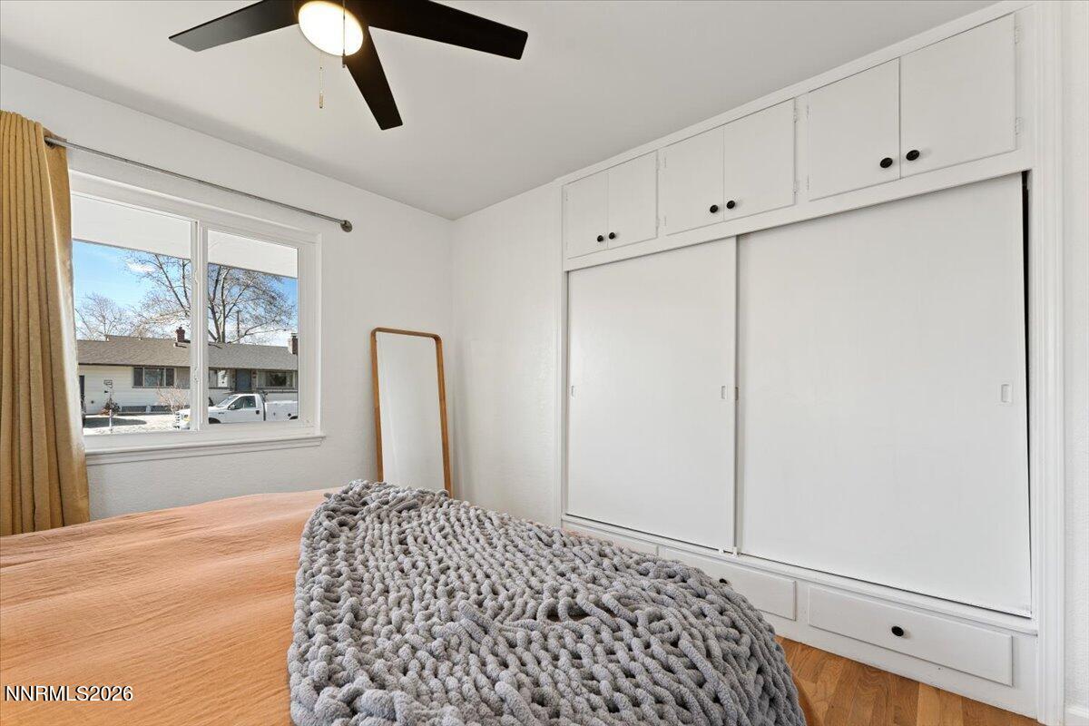 736 Yori Avenue Reno, NV 89502 - Photo 18 of 35 a bedroom with a bed and a window