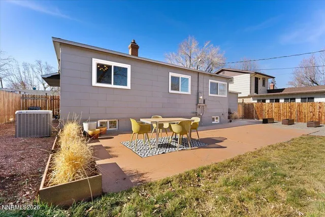 a building outdoor space with patio furniture