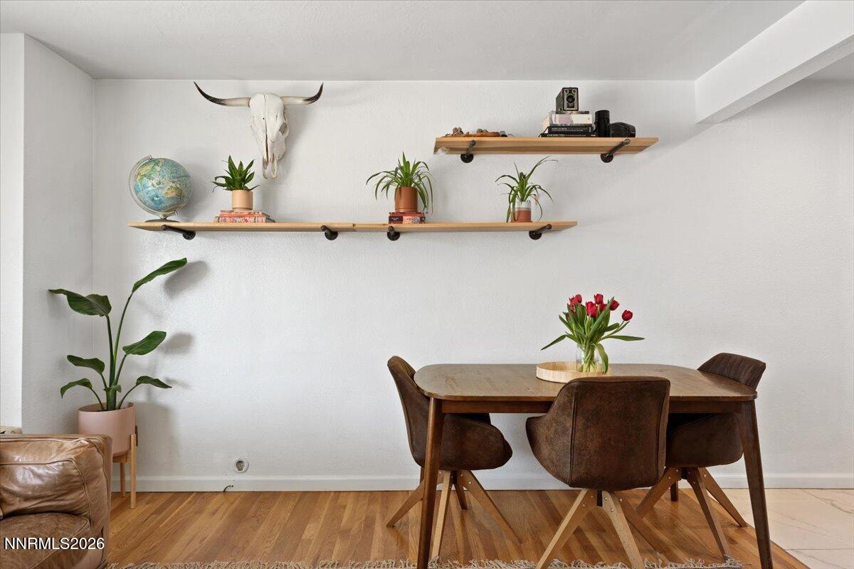 736 Yori Avenue Reno, NV 89502 - Photo 10 of 35 a dining room with furniture and wooden floor