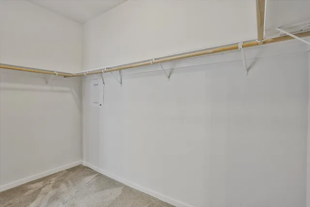 a view of an empty walk in closet
