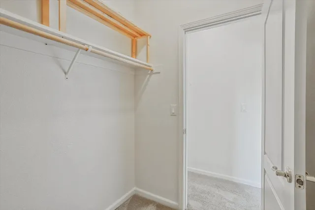 a view of a room with racks on the wall