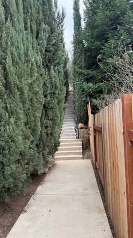 a view of a pathway of a building with stairs
