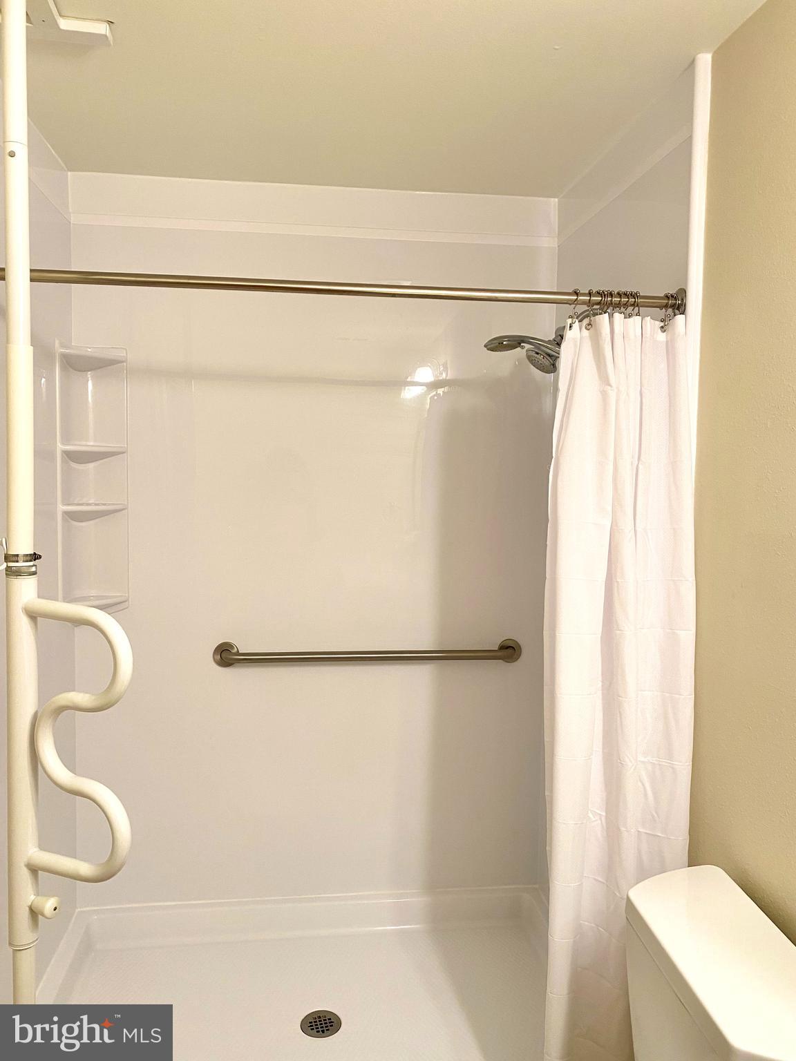 3408 Hallaton Court, Unit 165B Silver Spring, MD 20906 - Photo 18 of 40 BATH FITTER SHOWER, NEW COMMODE, CUSTOM GRAB BAR